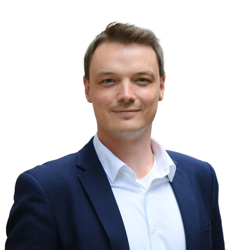 Matthias Mauerer in blauem Anzug und weißem Hemd